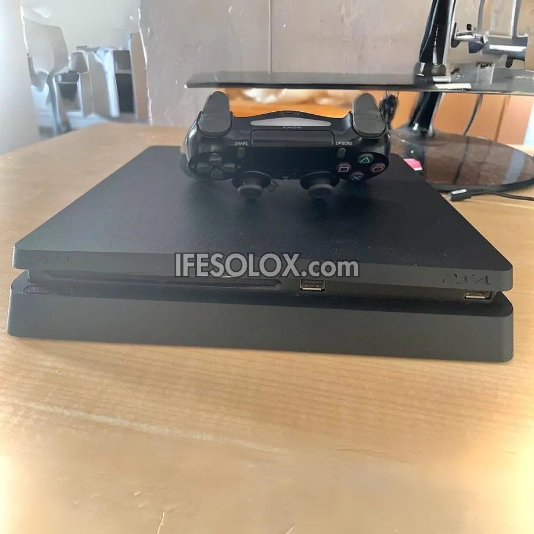 Sony Playstation 4 (PS4) Slim 1TB Game Console with 1 DUALSHOCK 4 Controller and 10 Games - Foreign Used